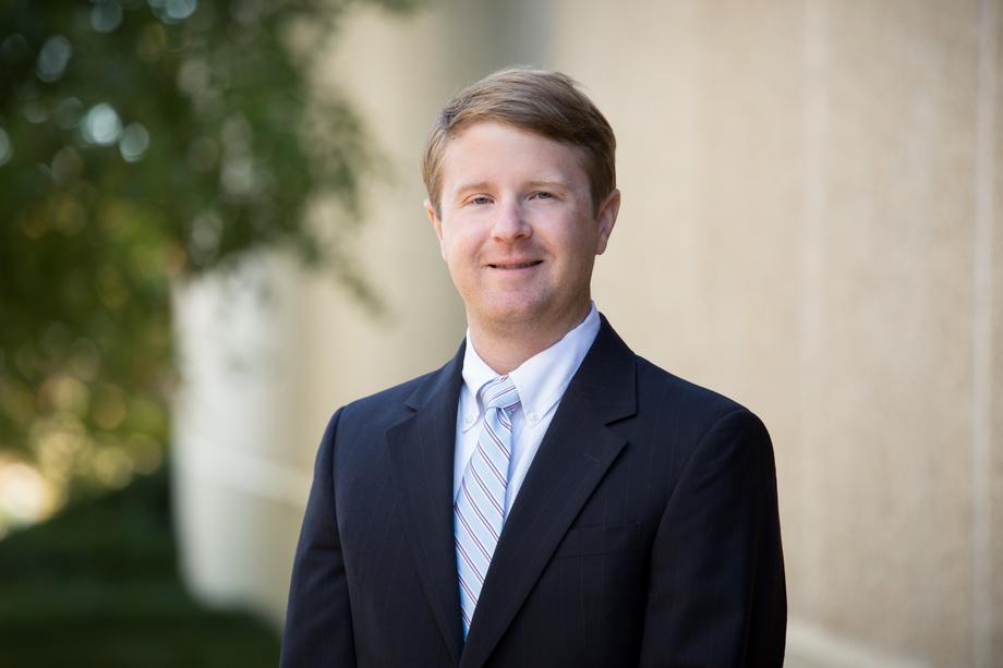 A person in a suitDescription automatically generated with medium confidence